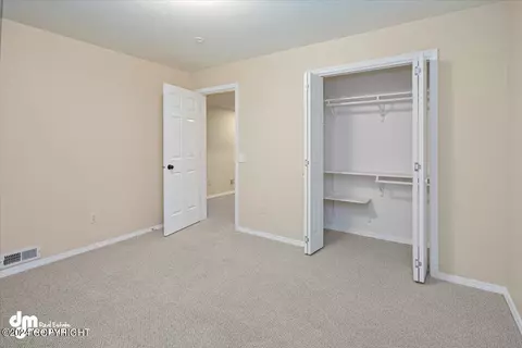 Bedroom - 4822 Hunter Dr, Anchorage, AK 99502 photo 4 of 5