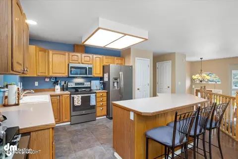 Kitchen - 19732 Samalga Cir, Eagle River, AK 99577 photo 4 of 6