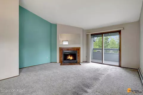 Living - 1859 E Tudor Rd # C-304, Anchorage, AK 99507 photo 1 of 4