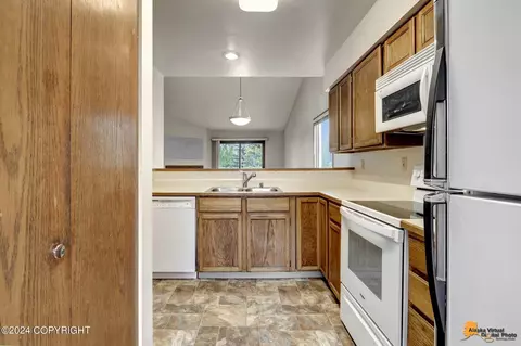 Kitchen - 1859 E Tudor Rd # C-304, Anchorage, AK 99507 photo 2 of 2