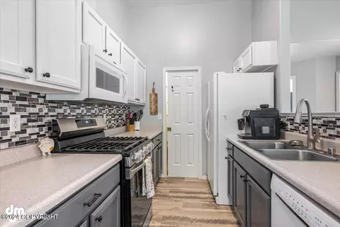 Kitchen - 12009 Regency Dr # B, Eagle River, AK 99577 photo 2 of 3