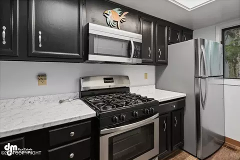 Kitchen - 1850 E 72nd Ave # 01, Anchorage, AK 99507 photo 2 of 3