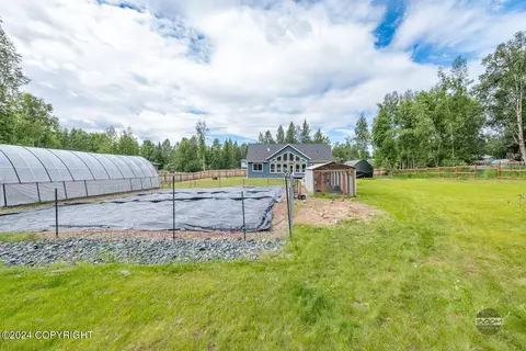 Exterior - 23070 Sheltering Spruce Ave, Chugiak, AK 99567 photo 9 of 12