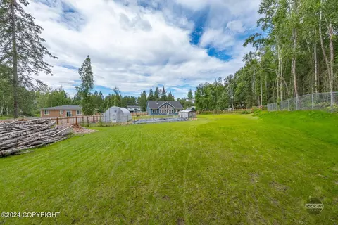 Exterior - 23070 Sheltering Spruce Ave, Chugiak, AK 99567 photo 10 of 12