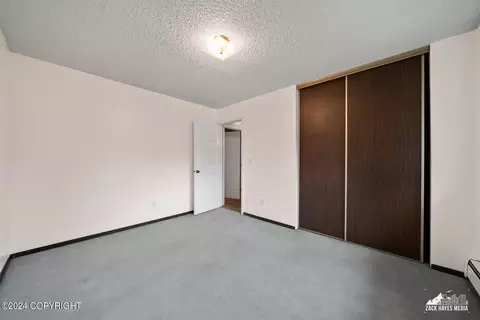 Bedroom - 7141 E 34th Ave, Anchorage, AK 99504 photo 4 of 8