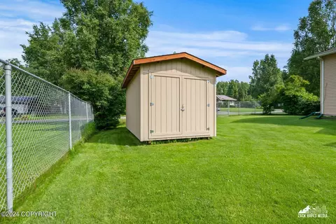 Exterior - 7141 E 34th Ave, Anchorage, AK 99504 photo 13 of 17