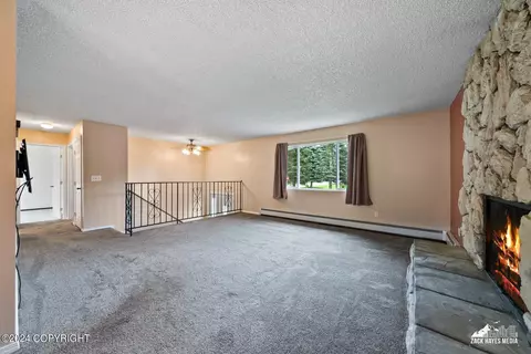 Living - 7141 E 34th Ave, Anchorage, AK 99504 photo 5 of 8