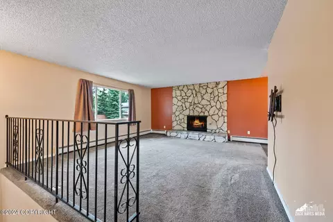 Living - 7141 E 34th Ave, Anchorage, AK 99504 photo 1 of 8