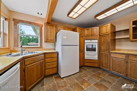 Kitchen - 7141 E 34th Ave, Anchorage, AK 99504 photo 7 of 7