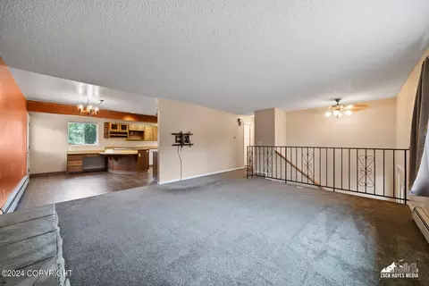 Living - 7141 E 34th Ave, Anchorage, AK 99504 photo 4 of 8