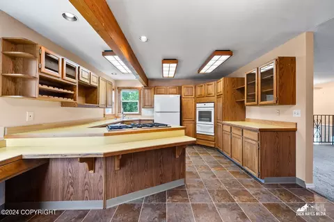 Kitchen - 7141 E 34th Ave, Anchorage, AK 99504 photo 2 of 7
