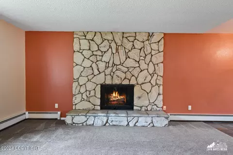 Living - 7141 E 34th Ave, Anchorage, AK 99504 photo 3 of 8