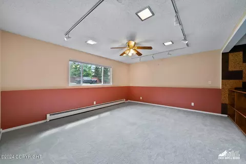 Living - 7141 E 34th Ave, Anchorage, AK 99504 photo 6 of 8