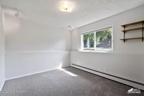 Bedroom - 7141 E 34th Ave, Anchorage, AK 99504 photo 5 of 8