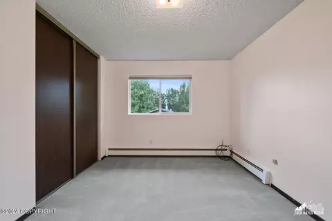 Bedroom - 7141 E 34th Ave, Anchorage, AK 99504 photo 3 of 8