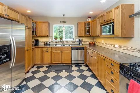 Kitchen - 3650 Hiland Rd, Eagle River, AK 99577 photo 2 of 2