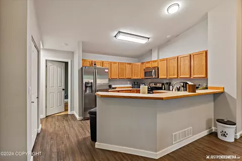Kitchen - 8937 Eagle Place Loop # 22, Eagle River, AK 99577 photo 5 of 5