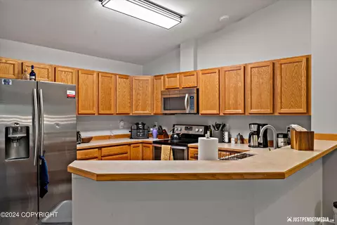 Kitchen - 8937 Eagle Place Loop # 22, Eagle River, AK 99577 photo 1 of 5