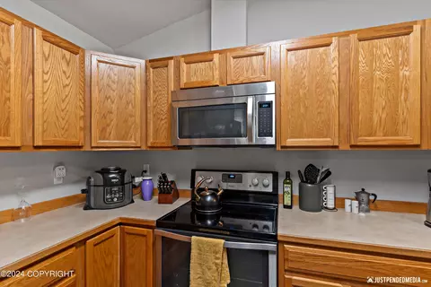 Kitchen - 8937 Eagle Place Loop # 22, Eagle River, AK 99577 photo 2 of 5