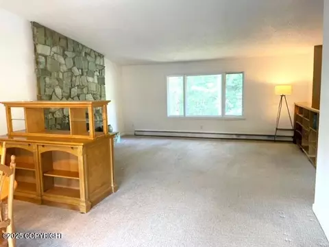 Living - 7700 E 32nd Ave, Anchorage, AK 99504 photo 3 of 13