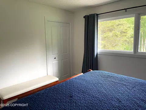 Bedroom - 7700 E 32nd Ave, Anchorage, AK 99504 photo 7 of 9