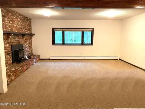 Living - 7700 E 32nd Ave, Anchorage, AK 99504 photo 12 of 13