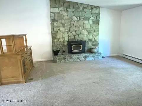 Living - 7700 E 32nd Ave, Anchorage, AK 99504 photo 1 of 13