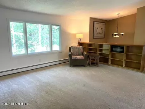 Living - 7700 E 32nd Ave, Anchorage, AK 99504 photo 2 of 13