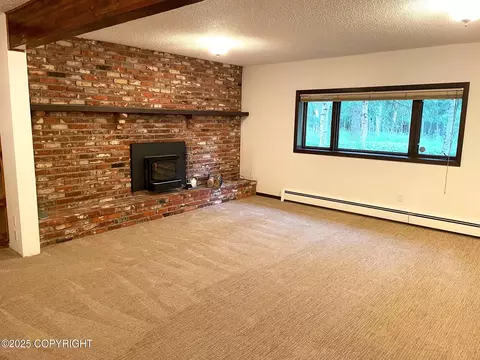 Living - 7700 E 32nd Ave, Anchorage, AK 99504 photo 10 of 13