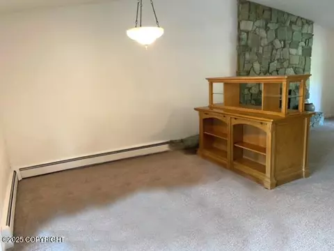 Living - 7700 E 32nd Ave, Anchorage, AK 99504 photo 4 of 13