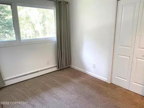 Bedroom - 7700 E 32nd Ave, Anchorage, AK 99504 photo 8 of 9