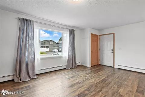 Living - 5439 E 4th Ave, Anchorage, AK 99508 photo 3 of 5