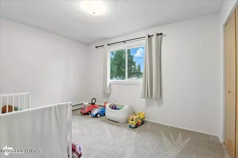 Bedroom - 5439 E 4th Ave, Anchorage, AK 99508 photo 6 of 8