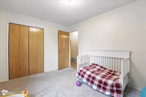 Bedroom - 5439 E 4th Ave, Anchorage, AK 99508 photo 7 of 8