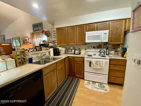 Kitchen - 1889 E Tudor Rd # E-304, Anchorage, AK 99507 photo 1 of 2