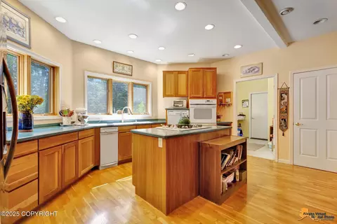 Kitchen - 6550 E 112th Ave, Anchorage, AK 99516 photo 2 of 11