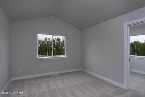 Bedroom - 8887 Sasquatch Cir, Eagle River, AK 99577 photo 6 of 8