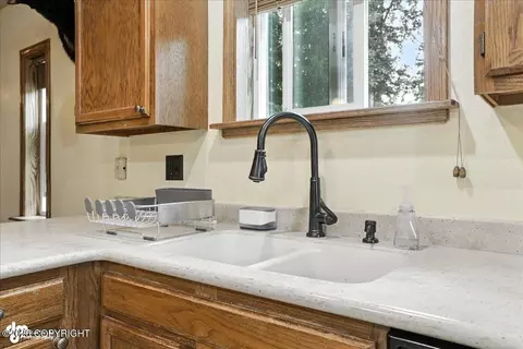 Kitchen - 7801 Evander Dr, Anchorage, AK 99518 photo 3 of 4