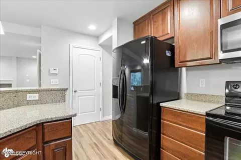 Kitchen - 20780 Icefall Dr, Eagle River, AK 99577 photo 2 of 2