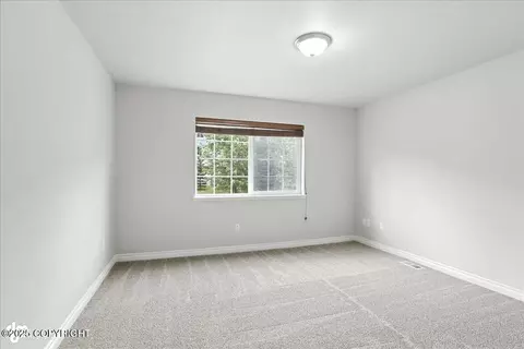 Bedroom - 20780 Icefall Dr, Eagle River, AK 99577 photo 3 of 4