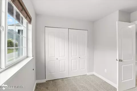 Bedroom - 20780 Icefall Dr, Eagle River, AK 99577 photo 2 of 4
