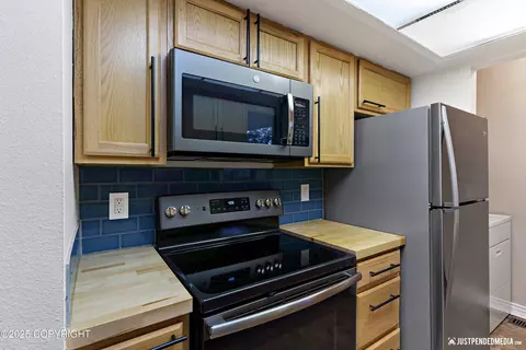 Kitchen - 420 E 56th Ave # 7H, Anchorage, AK 99518 photo 2 of 2