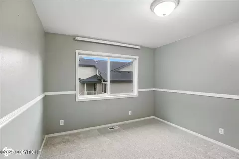 Bedroom - 20420 Williamsburg Dr, Eagle River, AK 99577 photo 4 of 9