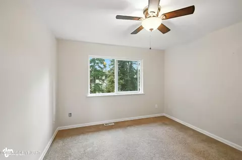 Bedroom - 8725 Colusa Cir, Eagle River, AK 99577 photo 6 of 9