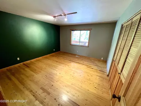 Bedroom - 21040 Scenic Dr, Chugiak, AK 99567 photo 2 of 5