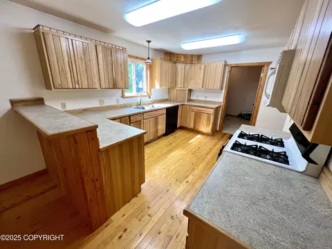 Kitchen - 21040 Scenic Dr, Chugiak, AK 99567 photo 2 of 8