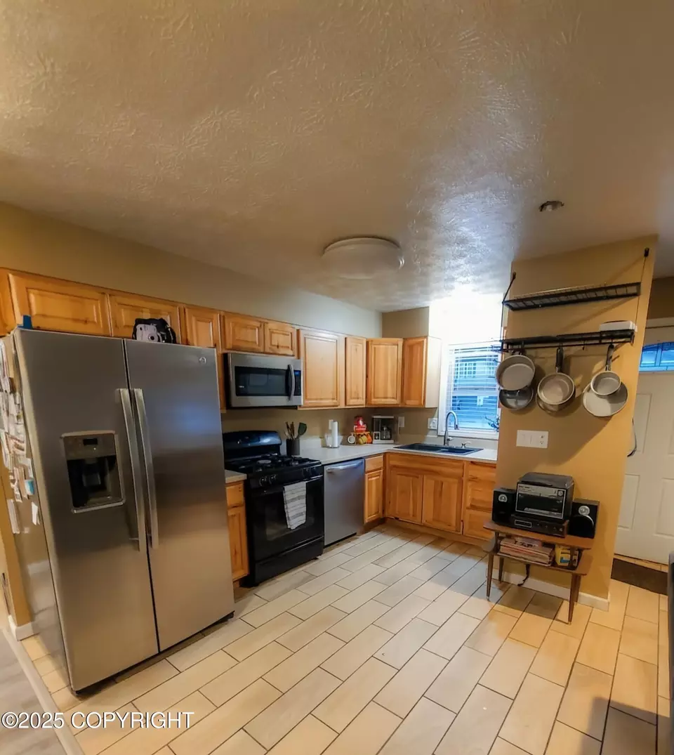 Kitchen - 7230 Basel St, Anchorage, AK 99507 photo 5 of 6