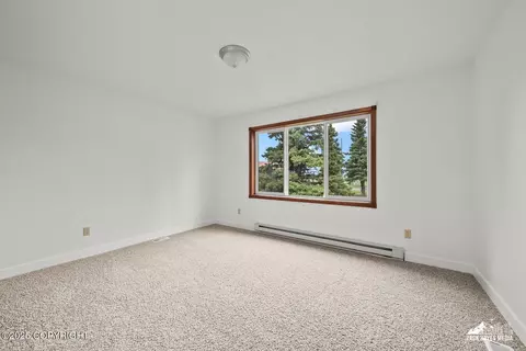 Bedroom - 424 E Manor Ave, Anchorage, AK 99501 photo 6 of 9