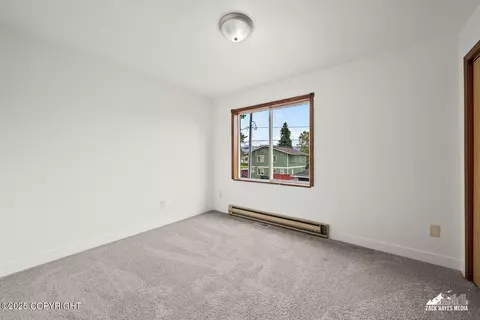 Bedroom - 424 E Manor Ave, Anchorage, AK 99501 photo 3 of 9