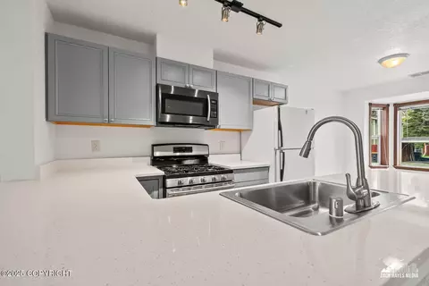 Kitchen - 424 E Manor Ave, Anchorage, AK 99501 photo 4 of 14